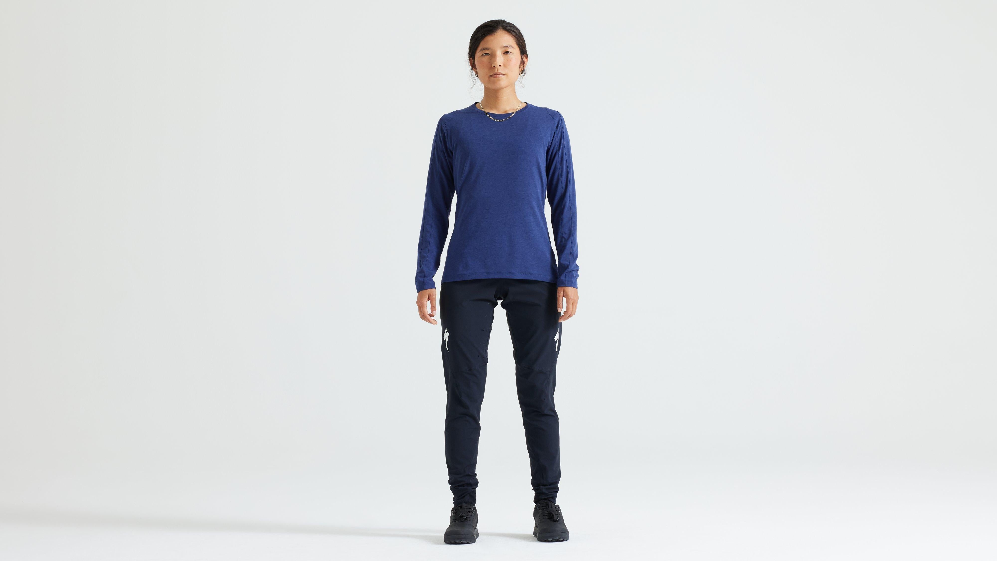 64123-452_APP_TRAIL-JERSEY-LS-WMN-DPMRNBLU_HERO.jpg