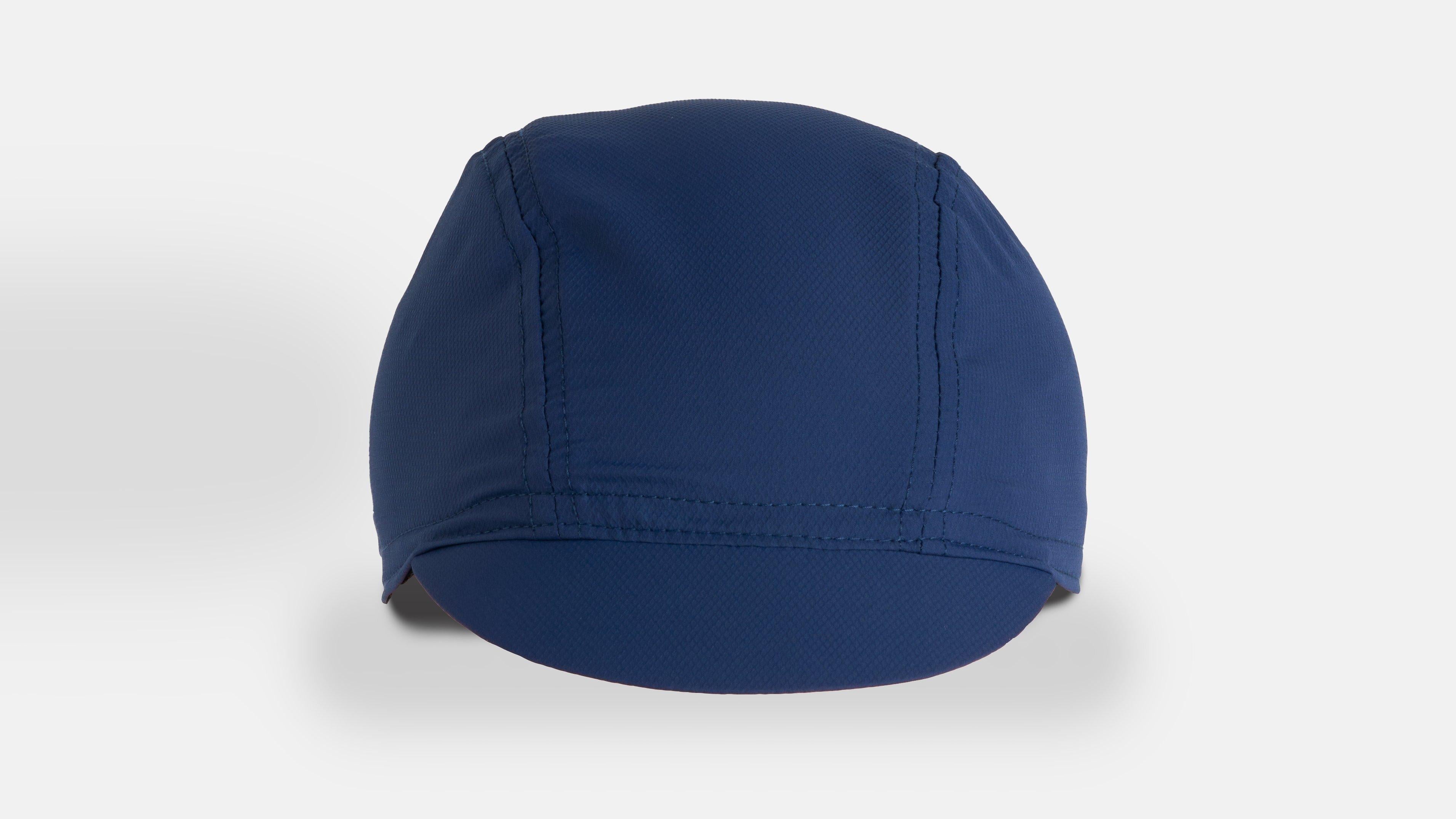 64823-090_APP_DEFLECT-UV-CYCLING-CAP-DKNVY_HERO.jpg