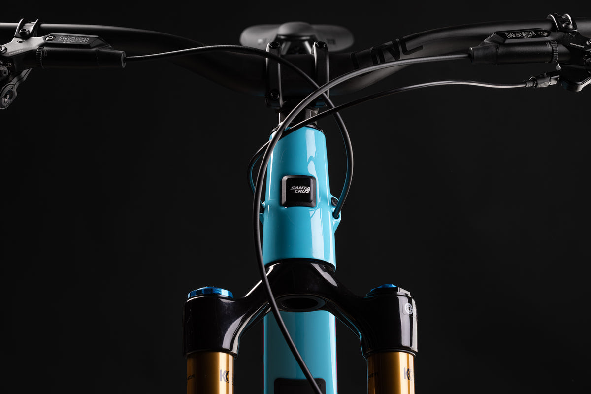 https://www.santacruzbicycles.com/cdn/shop/files/MY27_Nomad_Details_007_fc48e2eb-bcbf-4c35-abbf-2990848dc914.jpg?v=1775668302&width=1200